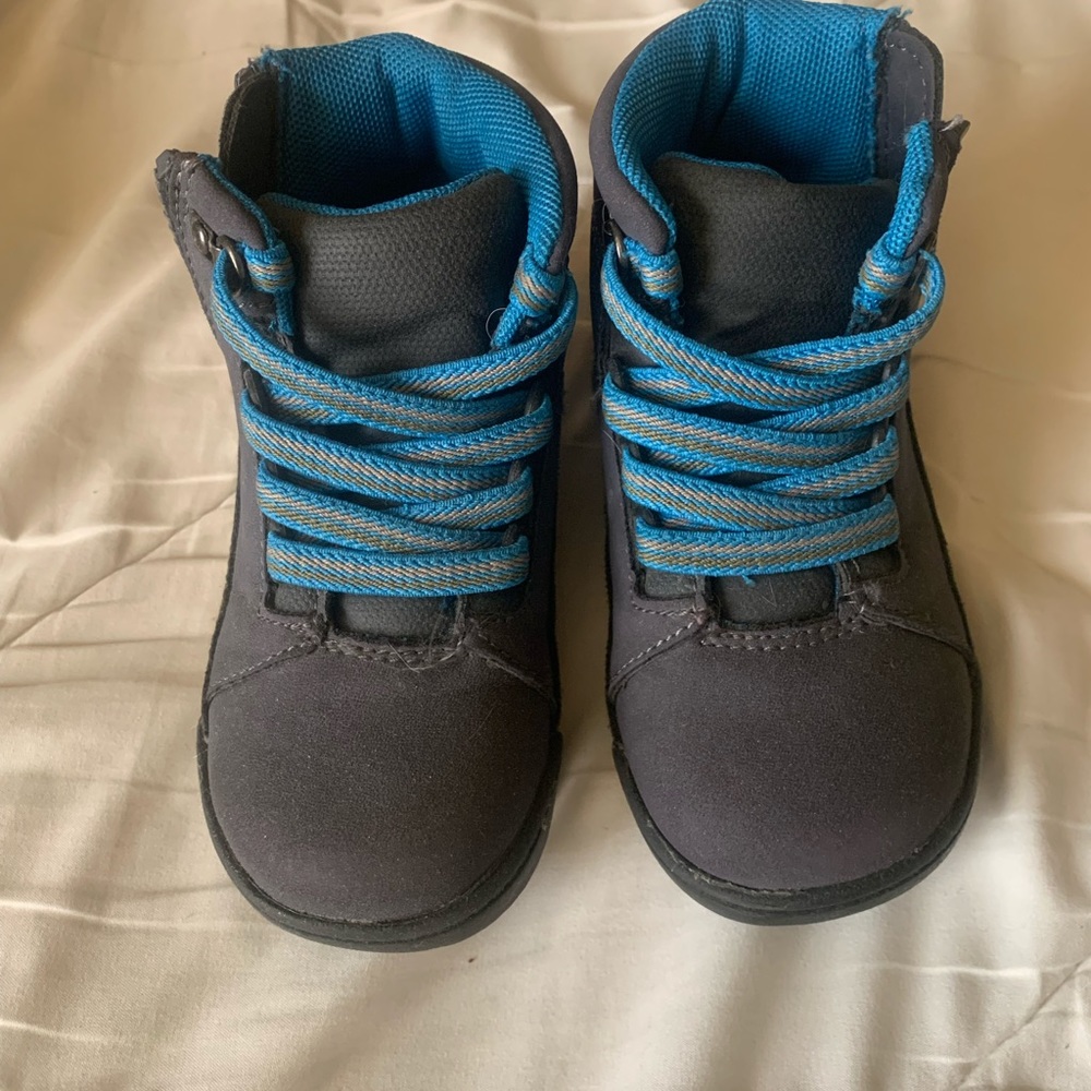 Boy navy Carter’s boots.